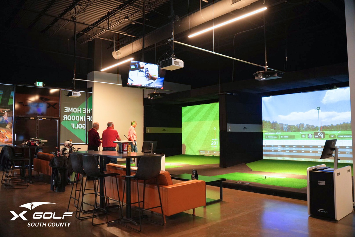 Golf simulator bays at an indoor facility