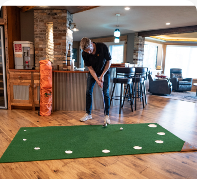 The Original 9Putt™ Mat — Person putting